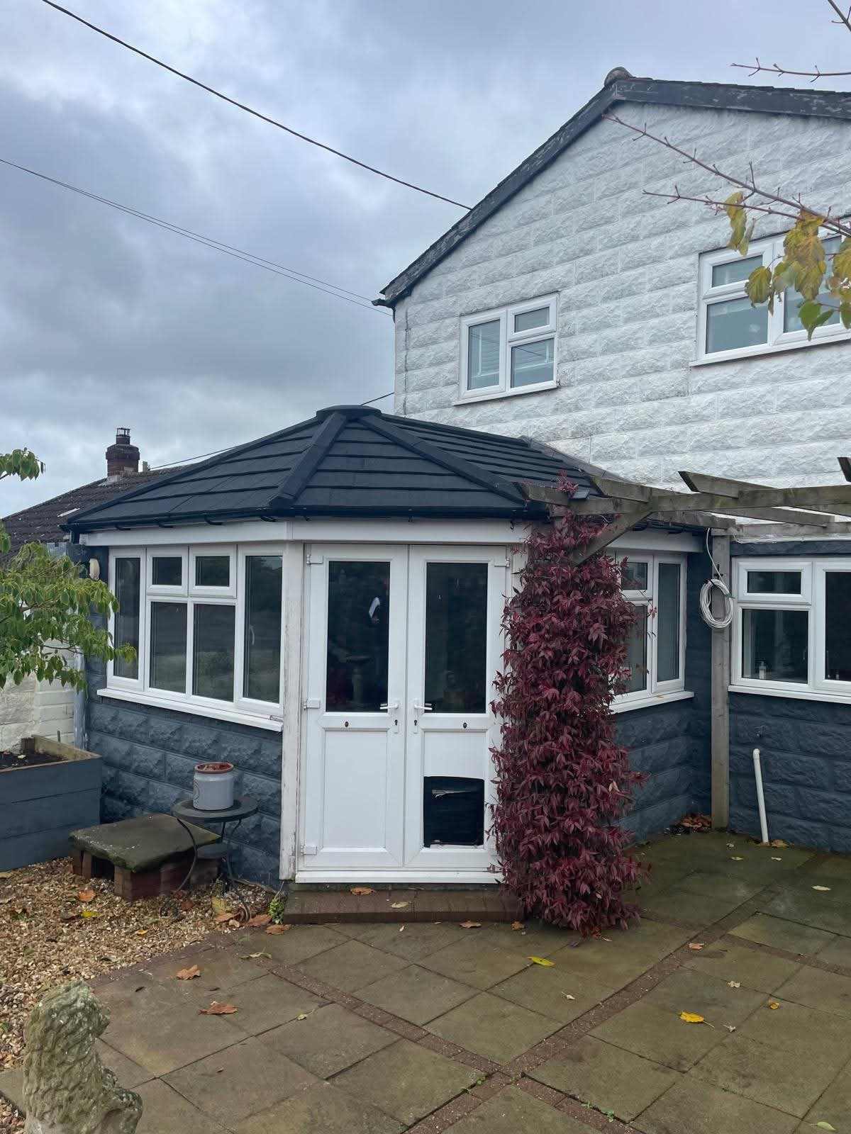 Black tile re-roof, Welshpool